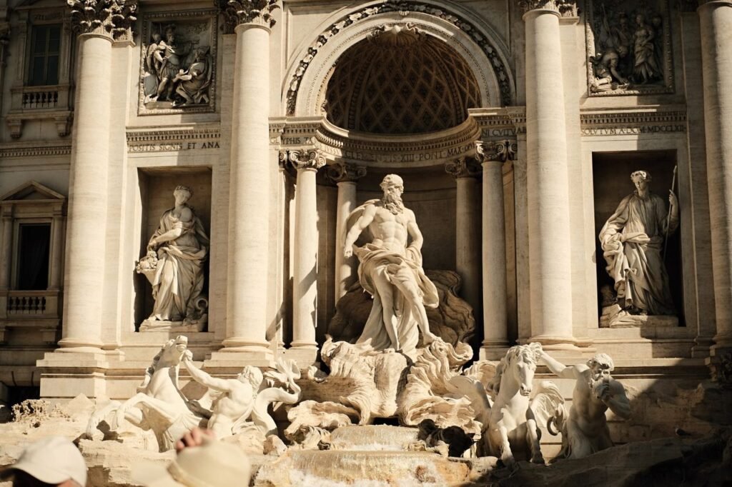 A detailed view of the iconic Trevi Fountain in Rome, showcasing its Baroque-style sculptures and architecture.